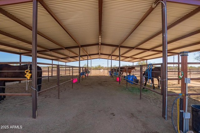 view of stable featuring a rural view