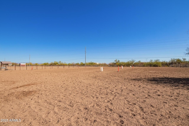 view of yard with a rural view