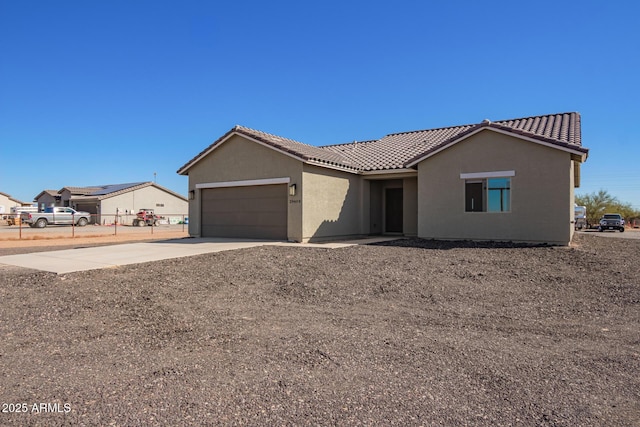 view of front of property featuring a garage