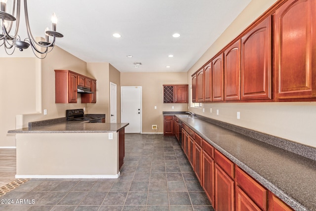 kitchen with hanging light fixtures, a chandelier, black range oven, and sink