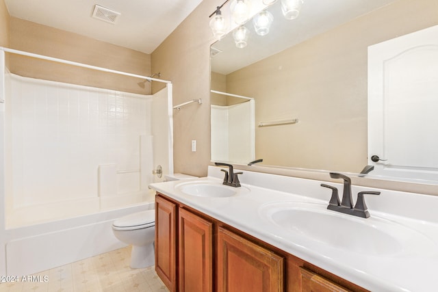 full bathroom featuring vanity, toilet, and bathtub / shower combination