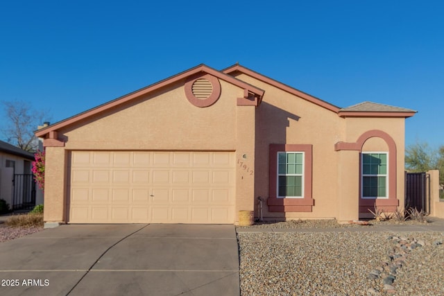 view of front of home with a garage