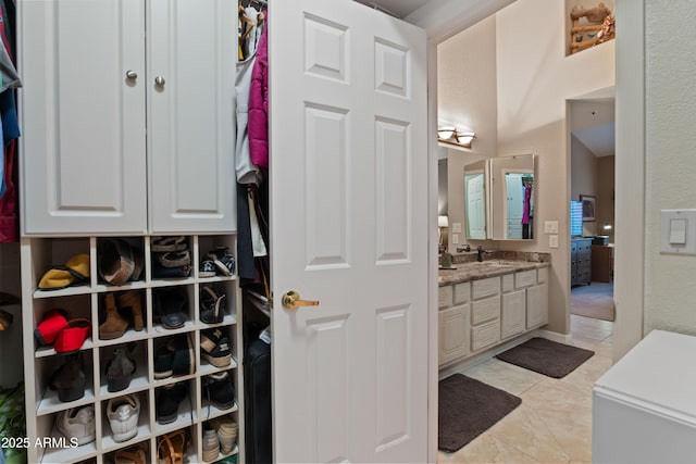 bathroom with vanity and tile patterned floors