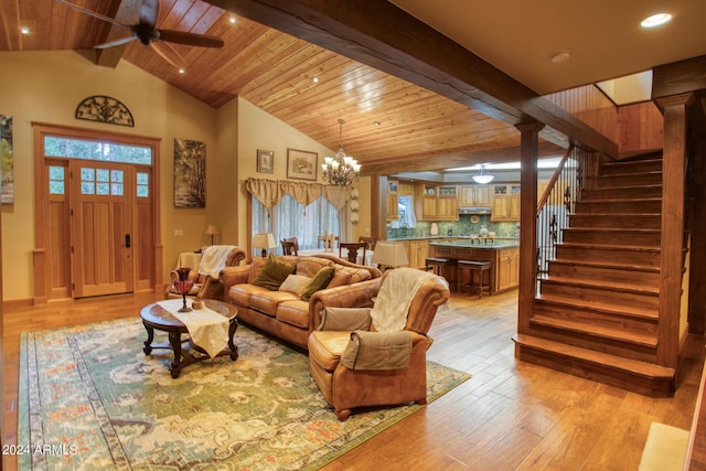 living area featuring recessed lighting, wood ceiling, light wood-style floors, stairway, and beam ceiling