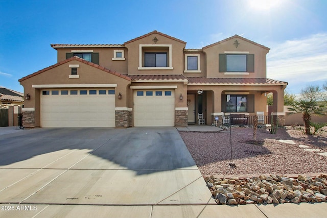 mediterranean / spanish-style home with a porch and a garage