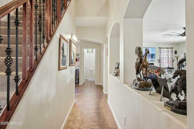 hallway with light tile patterned floors