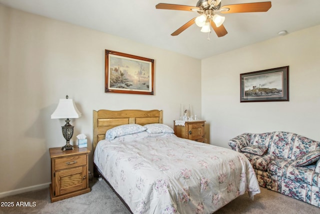 bedroom with ceiling fan and light colored carpet