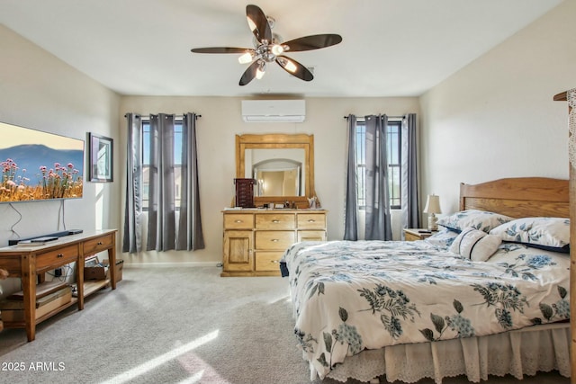 carpeted bedroom with a wall mounted air conditioner and ceiling fan