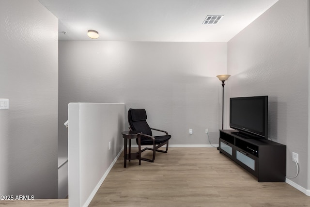 living area featuring light hardwood / wood-style flooring