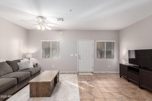 living room with ceiling fan