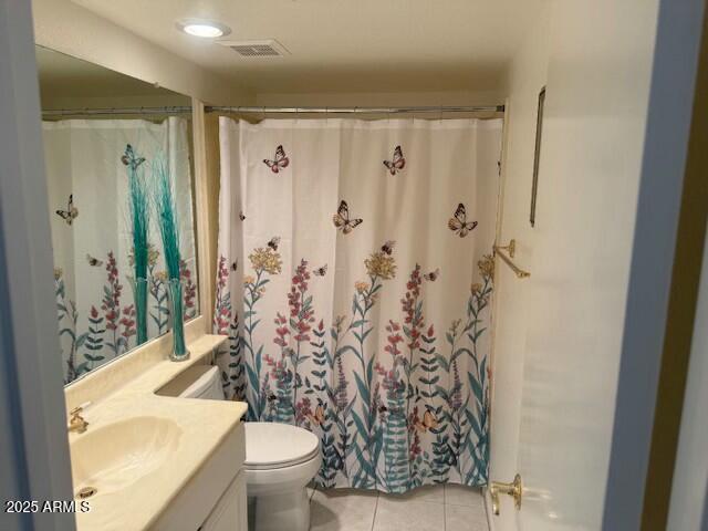 bathroom with tile patterned flooring, toilet, a shower with shower curtain, vanity, and visible vents