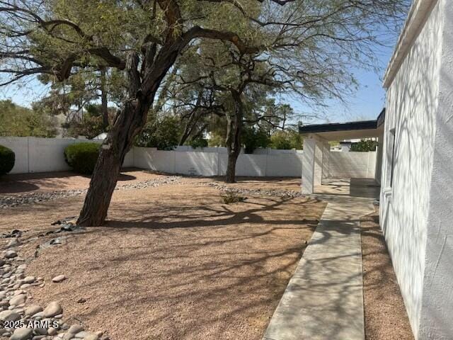 view of yard featuring a fenced backyard