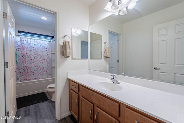 full bath with toilet, wood finished floors, vanity, shower / bathtub combination with curtain, and a chandelier