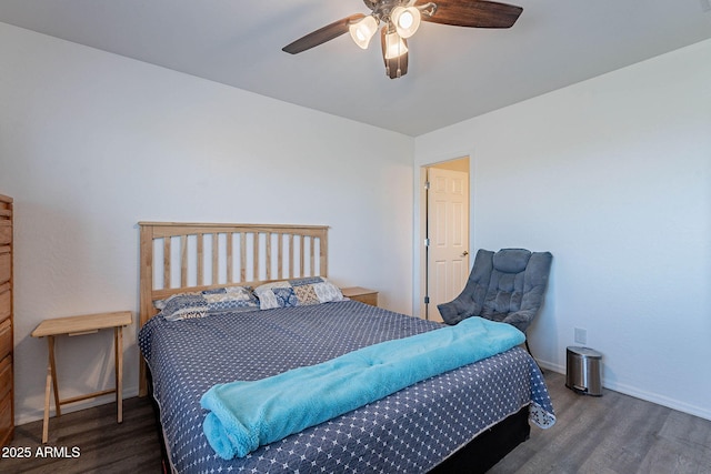 bedroom featuring wood finished floors, baseboards, and ceiling fan