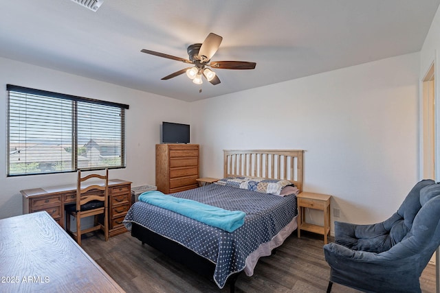 bedroom with wood finished floors and ceiling fan