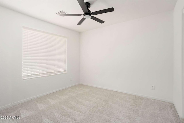 23772 W Grove St, Buckeye, AZ 85326 - carpeted spare room featuring ceiling fan and baseboards