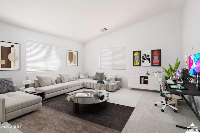 23772 W Grove St, Buckeye, AZ 85326 - carpeted living area featuring vaulted ceiling and a desk