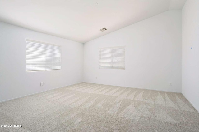 23772 W Grove St, Buckeye, AZ 85326 - unfurnished room with vaulted ceiling and light colored carpet