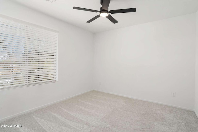 23772 W Grove St, Buckeye, AZ 85326 - spare room with carpet floors, ceiling fan, and baseboards