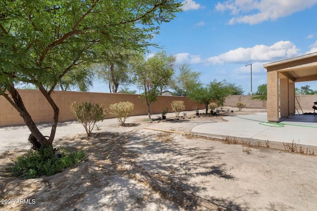 23772 W Grove St, Buckeye, AZ 85326 - fenced backyard featuring a patio area