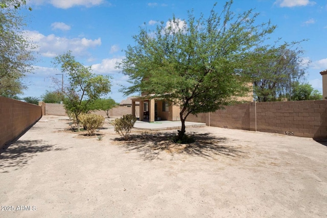 23772 W Grove St, Buckeye, AZ 85326 - fenced backyard featuring a patio area