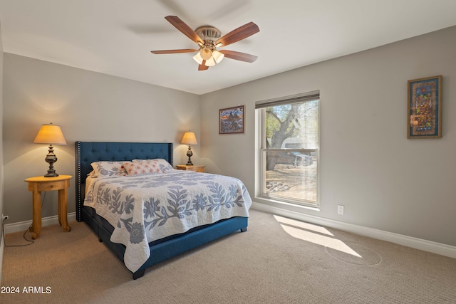 bedroom featuring ceiling fan and carpet flooring