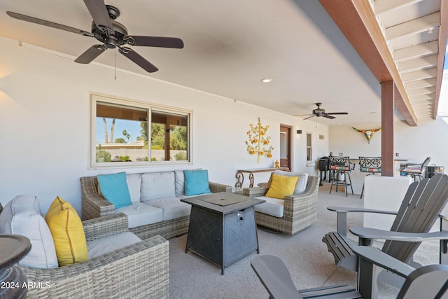 view of patio with ceiling fan and an outdoor hangout area