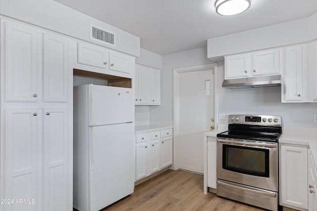 kitchen with stainless steel range with electric cooktop, white cabinets, light hardwood / wood-style flooring, and white fridge