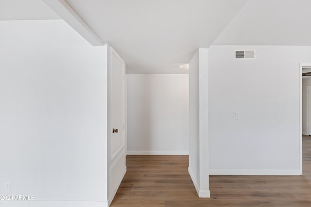 unfurnished room featuring wood-type flooring