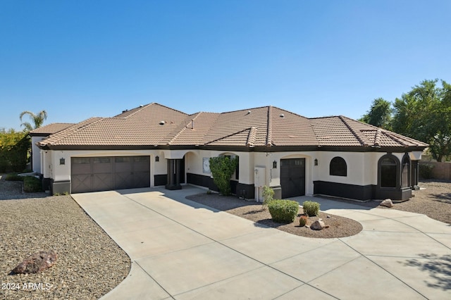 view of front of home with a garage