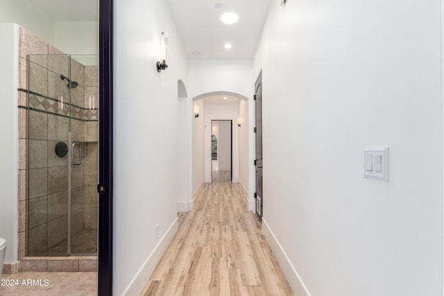 corridor featuring light wood-type flooring