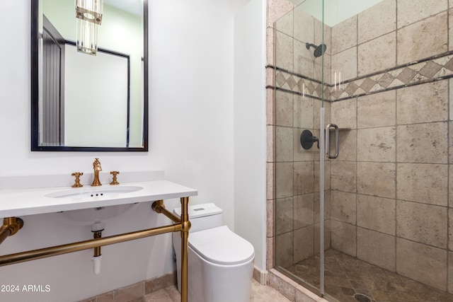 bathroom with vanity, toilet, and walk in shower