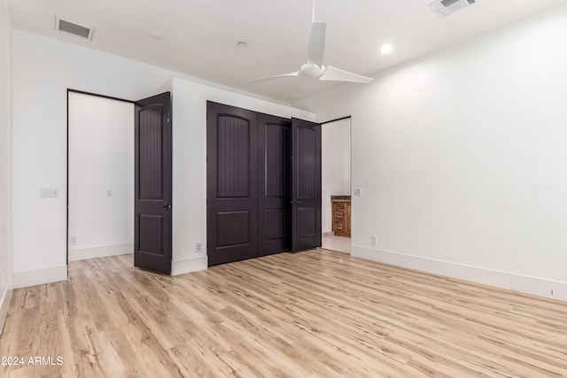 unfurnished bedroom featuring ceiling fan and light hardwood / wood-style floors