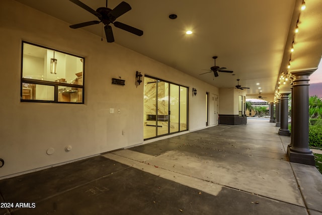 view of patio featuring ceiling fan