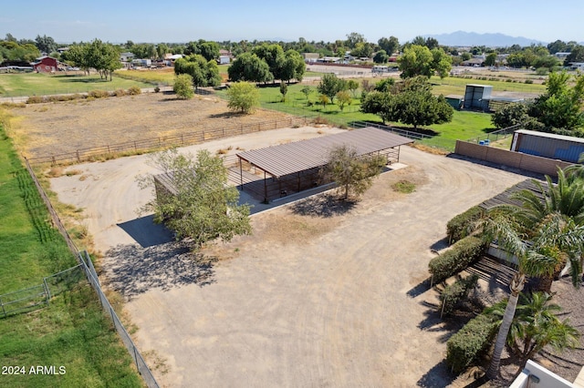 drone / aerial view with a mountain view and a rural view