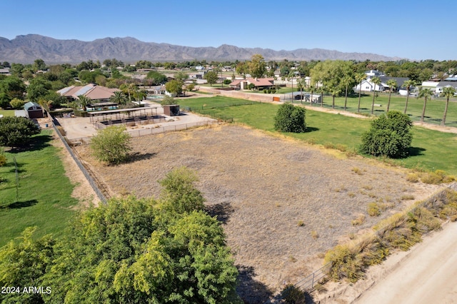 birds eye view of property featuring a mountain view