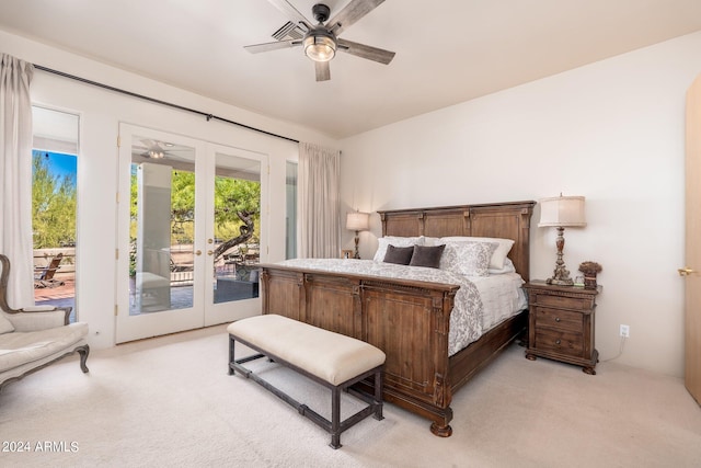 bedroom with light carpet, french doors, access to outside, and ceiling fan