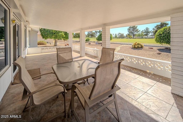 view of patio with outdoor dining area