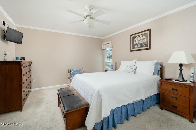 bedroom featuring baseboards, ornamental molding, a ceiling fan, and light colored carpet