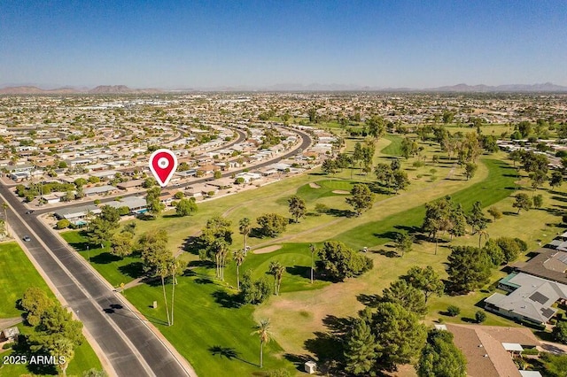 birds eye view of property featuring a residential view, a mountain view, and golf course view