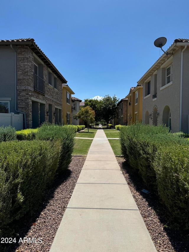 view of community featuring a yard