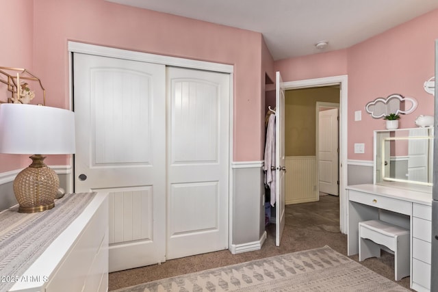 36641 N Railway St, San Tan Valley, AZ 85140 - bedroom featuring carpet floors, a closet, and a wainscoted wall