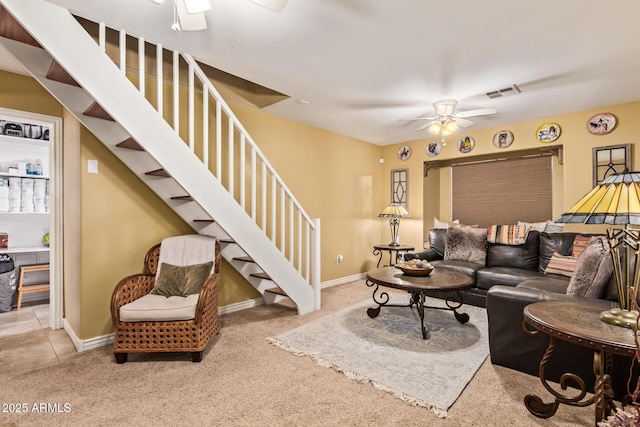 36641 N Railway St, San Tan Valley, AZ 85140 - living room with ceiling fan, carpet, visible vents, and stairs