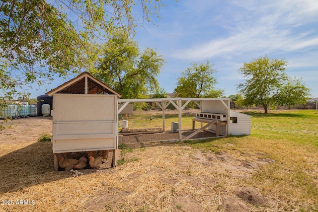 36641 N Railway St, San Tan Valley, AZ 85140 - view of yard featuring an outbuilding and exterior structure
