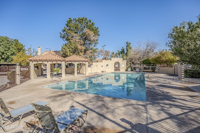 view of pool featuring a patio area