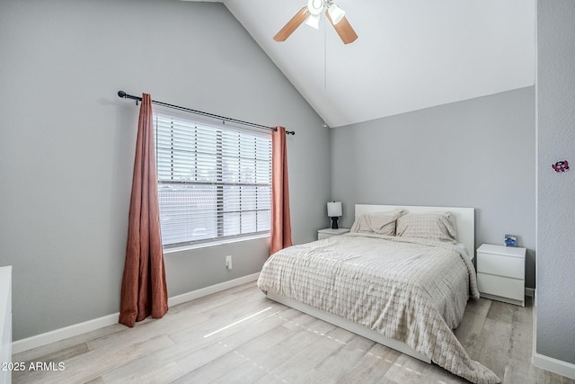 bedroom featuring vaulted ceiling, ceiling fan, and light hardwood / wood-style floors