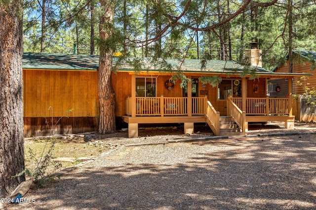 view of front of property featuring covered porch