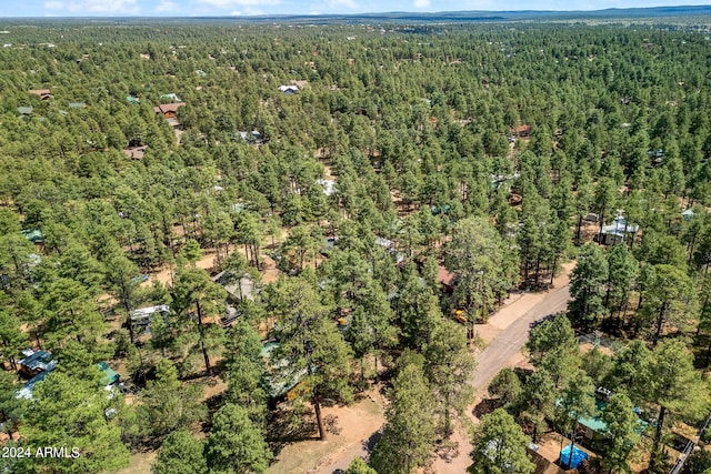 aerial view featuring a view of trees