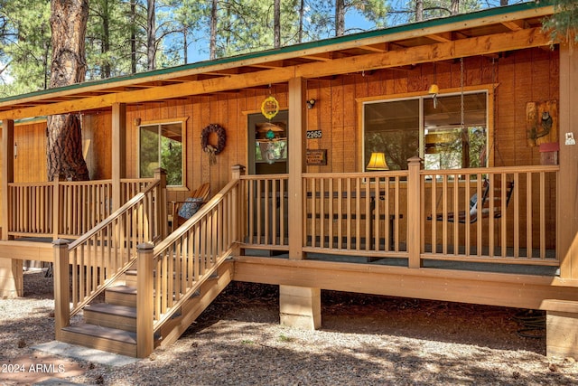 property entrance with a porch