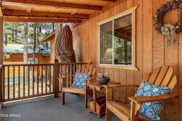 sunroom / solarium with beam ceiling